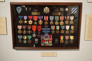 A shadow box showing medals belonging to Audie Murphy.