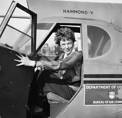 Why Did Amelia Earhart receive the Flying Cross medal?